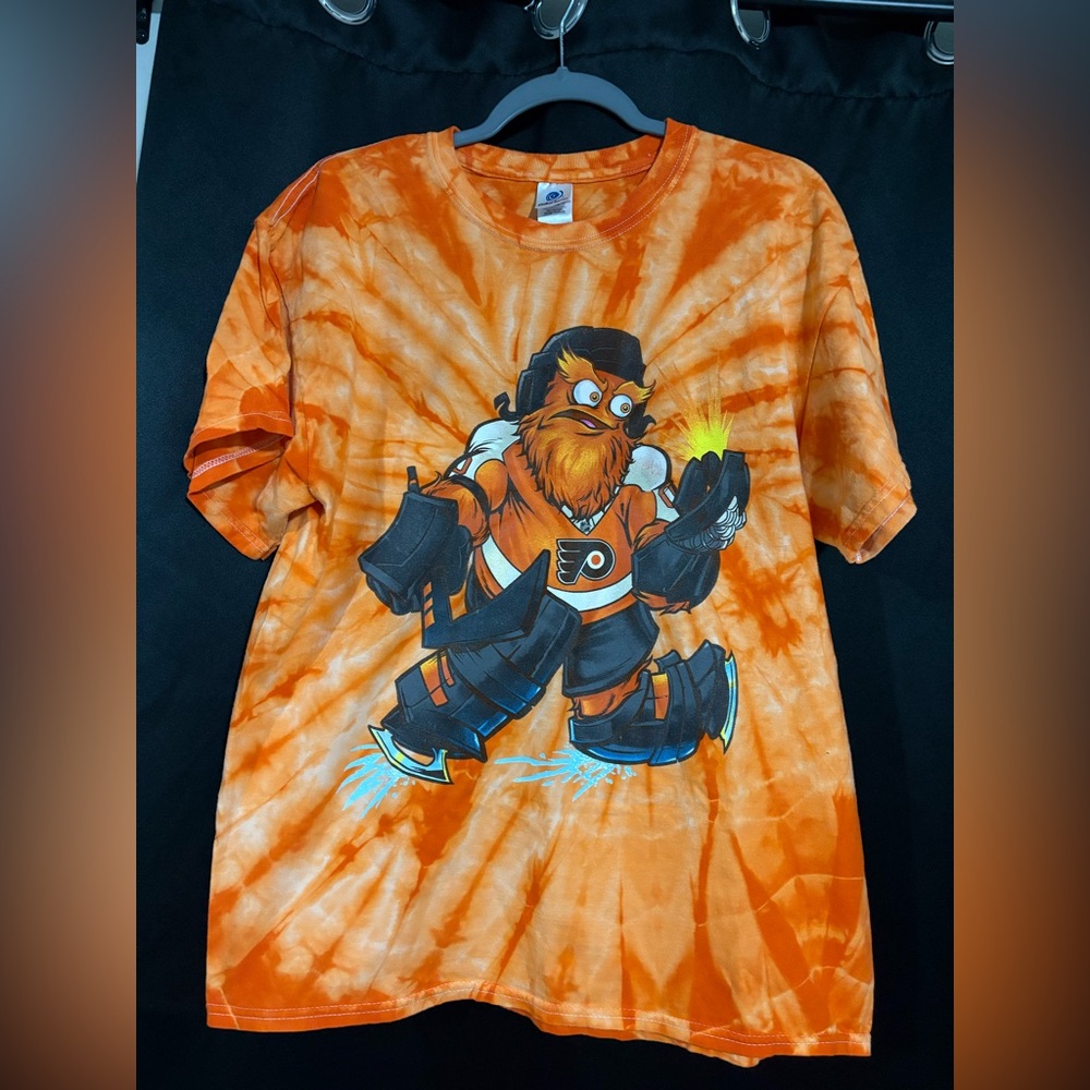 Vibrant Orange Tie-Dye Kids T-Shirt with Fun Character